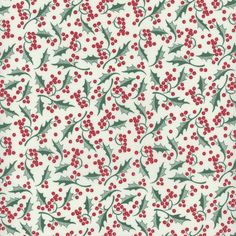 holly and berries on white fabric with red berries in the center, as well as green leaves