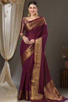 Perfectly cut, this burgundy maroon georgette saree will make you ready to make a statement in the upcoming occassion.This sweetheart neckline and elbow sleeved blouse is designed using weaved zari work.It is along with georgette broad border saree in burgundy maroon color accentuated with woven zari work.This blouse can be customized up to the maximum size available in inches 44 around the bust. Slight color variation may occur due to photographic reasons. Broad Border Saree, Border Saree, Zari Work, Georgette Saree, Georgette Fabric, Elbow Sleeve, Maroon Color, Georgette Sarees, Sweetheart Neckline