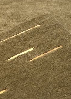 an aerial view of two rows of crops in the middle of a field with lines drawn on them