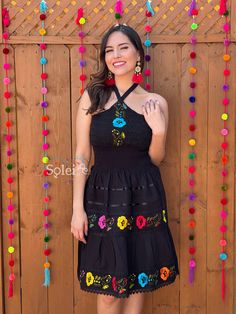 This Beautiful Halter Dress boasts a Traditional Mexican floral design combined with a modern style dress. The embroidered skirt with lace details combined with the halter top makes it fun and flirty. It's made out of fine Mexican cotton, has ties around the neck and elastic around the waist for a tighter fit. This dress is handmade and hand embroidered by Mexican Artisans in Oaxaca, Mexico. This dress comes in one size: Small/Medium Purchase the shoes modeled here: https://www.etsy.com/es/listi Summer Embroidered Halter Neck Dress, Embroidered Halter Neck Summer Dress, Embroidered Halter Neck Dress For Summer, Beach Dresses With Floral Embroidery And Halter Neck, Summer Floral Embroidered Halter Neck Dress, Floral Embroidered Halter Neck Beach Dress, Summer Halter Neck Dresses With Floral Embroidery, Party Dress With Floral Embroidery And Halter Neck, Party Halter Neck Dress With Floral Embroidery