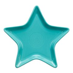 a blue star shaped dish on a white background