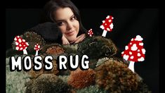 a woman is posing for a photo with mushrooms on her head and the words moss rug in front of her