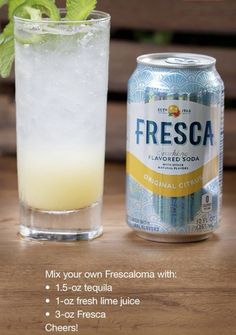 a can of fresca next to a glass filled with ice