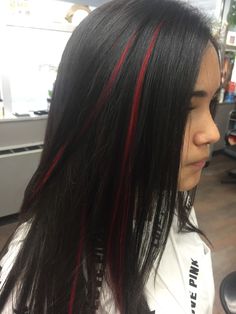 Black Hair W Red Underneath, One Hair Strand Dyed, One Strand Of Color In Hair Behind Ear, One Strand Dyed Hair, Underdye Hair Black, Dyed Strands Of Hair, One Strand Of Hair Dyed, One Strip Of Color In Hair, Red Strands In Hair