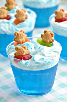 desserts in blue cups with teddy bears on top and gummy bears sticking out of them