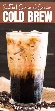 cold caramel cream cold brew in a tall glass with coffee beans on the side