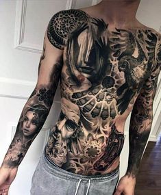 a man with lots of tattoos on his chest