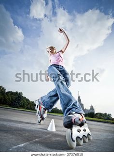 a skateboarder is doing tricks in the street