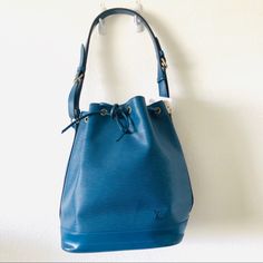 Louis Vuitton Petit Noe Blue Epi Leather Shoulder Bag. Purchased From Consignment, I Never Used It. Minor Imperfection On Strap, Bottom Of Bag And Brass On Buckle. Normal Wear On Finishing Of Trim(Waxed Area). Retail $1,900 Date Code Ar0934 Luxury Blue Shoulder Bucket Bag, Luxury Blue Bucket Bag, Luxury Blue Bucket Bag For Daily Use, Designer Blue Bucket Bag For Travel, Luxury Blue Bucket Bag For Shopping, Designer Blue Bucket Bag With Dust Bag, Luxury Blue Bucket Bag With Adjustable Strap, Designer Blue Bucket Bag, Luxury Blue Bucket Bag For Travel