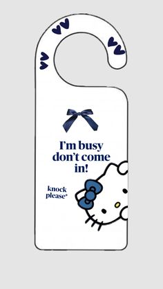 a door hanger with an image of a hello kitty and i'm busy don't come in