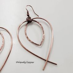 These copper earrings are my new favorite go to, to add a touch of elegance, with a bit of bohemian flare, to any outfit! They are antiqued copper that has been given a hand hammered finish in the center. The dangle earrings measure 3 inches from where the antiqued copper ear wire sits in your ear, and 1 3/4 inches wide. They are sure to become a favorite way to dress up any outfit! Perfect as a copper anniversary wife gift for her, for your 7th anniversary, or 22nd wedding anniversaries. Please Elegant Copper Teardrop Hoop Earrings, Elegant Teardrop Copper Hoop Earrings, Elegant Copper Teardrop Earrings Gift, 22nd Wedding Anniversary, Copper Anniversary Gifts, Copper Anniversary, 7th Anniversary, Copper Necklace, Wife Gift