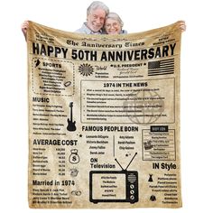 an old newspaper with the words happy 50th anniversary printed on it and two people holding up a