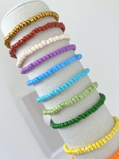 Solid Color Beaded Bracelet Stackable Bracelets Kids - Etsy Colorful Round Beads Friendship Bracelets, Everyday Rainbow Beaded Bracelets With Tiny Beads, Trendy Rainbow Beaded Bracelets, Everyday Colorful Beaded Stretch Bracelet, Everyday Rainbow Beaded Bracelets With Colorful Beads, Everyday Rainbow Beaded Bracelets, Everyday Rainbow Stretch Bracelet With Colorful Beads, Hypoallergenic Rainbow Beaded Bracelets With Round Beads, Everyday Rainbow Colored Beaded Bracelets