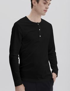 Our long sleeve three-button henley is unmistakably refined, yet subtle. It is destined to be an invaluable addition to your wardrobe given its versatility. Extremely soft, lightweight and elegantly fitted, making it a perfect option for layering or wearing it on its own.

Crafted from our premium lightweight jersey fabric — superfine two-fold (80/2) yarn made from the finest extra long staple Peruvian Pima cotton. Detailed with Mother of Pearl håndværk buttons.

We recommend that you take your Classic Fall Henley With Button Cuffs, Relaxed Fit Long Sleeve Tops With Snap Buttons, Classic Long Sleeve Tops For Everyday, Fall Layering Henley With Buttons, Long Sleeve Tops With Snap Buttons For Layering, Classic Button-up Henley With Buttons, Classic Henley For Fall Layering, Classic Long Sleeve Henley For Spring, Classic Fall Henley For Workwear