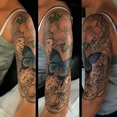 a woman's arm with tattoos on it and flowers in the middle, butterflies flying around