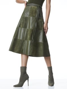 This midi skirt includes a mix of leather and suede (because sometimes you're naughty and sometimes you're nice, right?). It's truly stunning with everything from a white button-down to a tank top. alice + olivia Sosie Suede Patchwork Midi Skirt in Olive Green, Size 14 Suede Midi Skirt, Suede Patchwork, Godet Skirt, Braided Leather Belt, Micro Skirt, Striped Midi Skirt, Tank Top Outfits, Patchwork Skirt, Metallic Skirt