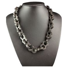 An attractive and unusual antique Victorian Vulcanite chain necklace. The necklace features large, chunky, fancy mariner style Links, interlocking along the length and it fastens with a black lacquered hook fastener so could double up as a watch / Albert chain. Vulcanite was first invented or discovered in 1839 by Charles Goodyear and it is a compound made up by mixing together rubber and sulphur to produce vulcanised rubber. It was a popular alternative to Whitby Jet as it was easier to source Luxury Victorian Chain Link Jewelry, Modern Black Link Necklace, Black Chunky Link Chain Necklace, Unique Black Chain Necklace, Charles Goodyear, Necklace Chunky, Double Up, Antique Necklace, Chain Link Necklace