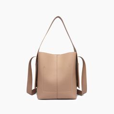 The Desert Dreamer Vegan Tote Bag has understated elegance and versatile design, making it a go-to accessory for the urban nomad. Add a touch of sophistication to any outfit and carry your dreams wherever you go. 100% Vegan Leather 12"W * 13"H * 7"D 6" top handle drop 22" detachable chain link Pull magnetic closure 16.50 oz Style# U2CN07 Desert Dreamer, Vegan Tote Bag, Big Tote Bags, Bow Bag, A Night To Remember, Designer Crossbody, Designer Crossbody Bags, Bag Light, Understated Elegance