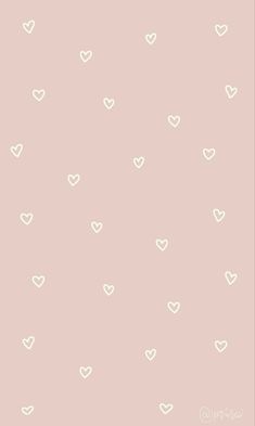 white hearts on a pale pink background wallpaper design by pretty little things for kids