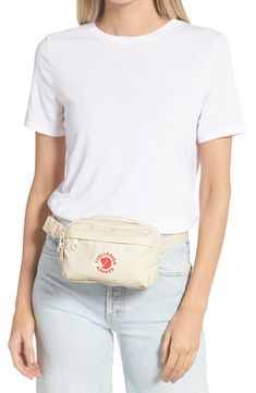 Keep your festival essentials protected against the elements in a sized-small belt bag. A top carry handle and adjustable belt strap allow you to carry the piece in your hand, secure it at your waist, or wear it across your chest for hands-free carry. 7"W x 4 1/4"H x 2 1/4"D.
2" – 20" strap drop Top two-way zip-around closure Top carry handles; adjustable belt strap with buckle closure Exterior zip pockets Synthetic/textile Imported Handbags Casual Outdoor Belt Bag With Adjustable Strap, Casual Belt Bag With Belt Loops For Outdoor, Casual Belt Bag With Adjustable Strap For Outdoor, Fjällräven Kånken, Festival Essentials, Small Belt, New Accessories, Drop Top, Bag Light