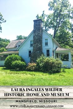 an old white house with the words laurel ingalls wilder historic home and museum