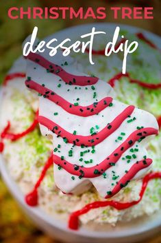 christmas tree dessert dip with sprinkles in a white bowl on a table