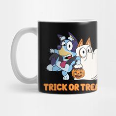 a black and white coffee mug with an image of a cartoon character holding a pumpkin