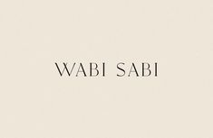 the word wabi sabi written in black on a white background