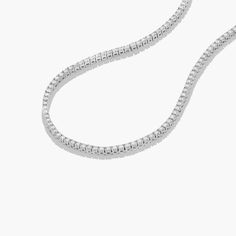 This tennis necklace is the epitome of elegance. A row of scintillating round brilliant diamonds are set on four prong baskets and lined up perfectly to create the most glamorous diamond necklace. A box clasp with security latch closes and secure the necklace in place. Diamond Tennis Necklace, Box Clasp, Tennis Necklace, Brilliant Diamond, Lab Created Diamonds, Round Brilliant, A Box, Lab Grown, Lab Grown Diamonds