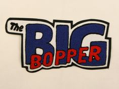 the big bopper logo is shown in red, white, and blue on a white background