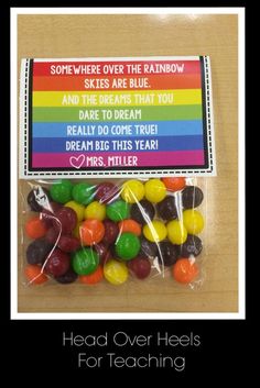 there is a bag full of candy with the words somewhere over the rainbow on it