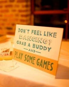 a sign that says don't feel like dancing grab a buddy and play some games