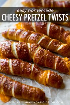 cheesy pretzel twists on wax paper with text overlay that reads cheesy pretzel twists