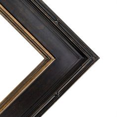 an old black and gold frame on a white background