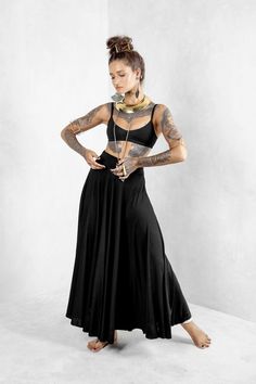 Feel the glamour in this elegant, feminine dreamy full circle maxi skirt. Gorgeous drape on this long, black skirt. Made from Tencel Modal eco friendly fabric it hangs like a dream, it is lightweight and swirls to perfection.  To see our entire collection of sustainable, low impact, slow fashion visit our shop https://www.etsy.com/shop/eleven44 This black maxi skirt comes in 3 sizes - see the chart on the last thumbnail for comprehensive sizing information. Flattering hemline at just above the a Goddess Skirt, Circle Maxi Skirt, Black Circle Skirt, Long Black Skirt, Long A Line Skirt, Flamenco Skirt, Bamboo Dress, Maxi Skirt Boho, Black Circle