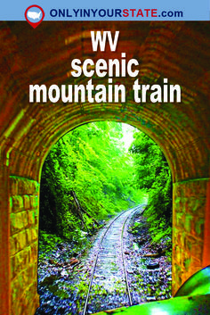 a train traveling through a tunnel with the words wy scenic mountain train