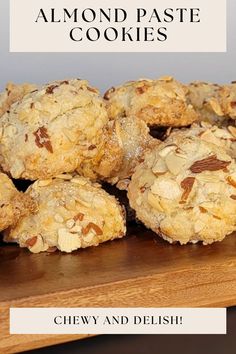 almond paste cookies piled on top of each other with the words chewy and delish