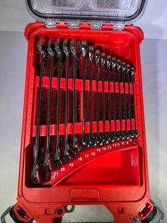 a red tool box filled with lots of tools