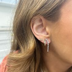 EF Collection Earrings that look and feel like a waterfall, we are in love with these sparkly new arrivals. Sure to add sparkle to any outfit, these diamond drop earrings are the perfect special occasion piece. Five diamonds sit still on a 14K gold curve, while the remaining 6 diamonds dangle from the ear to create eye catching movement. Brilliant Cut Diamond Drop Earrings For Evening, Evening Diamond Drop Earrings With Brilliant Cut, Glamorous Diamond Dangle Earrings, Glamorous Dangle Diamond Earrings, Fine Jewelry Sparkling Diamond Earrings, Party Diamond Drop Earrings With Brilliant Cut, White Gold Drop Linear Earrings With Diamond Accents, Sparkling Diamond Earrings For Anniversary, Elegant Diamond Accented Ear Climbers For Formal Events