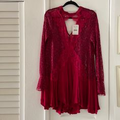 Free People Red Lace Dress. Low Cut, Long Sleeve, Size M, New With Tag! Red Lace Trim Dress For Night Out, Red Lace Dresses For Fall, Red Long Sleeve Dress With Lace Trim, Red Lace Dress, Red Lace, Free People Dresses, Free People Dress, Low Cut, Lace Dress