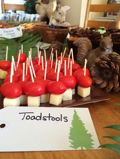 there are toothpicks with cherries on them in the shape of christmas trees