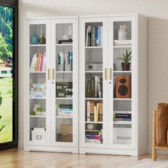 a white book case sitting next to a wooden chair in a living room with a sliding glass door