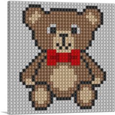 a cross stitch teddy bear with a red bow tie on it's chest, sitting in front of a white background