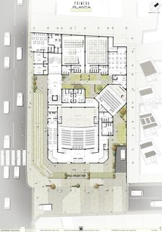 an aerial view of a building with lots of windows and parking lot area in the middle