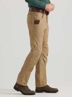 WORKWEAR WARDROBE STAPLE A style that works as hard as you do, our Wrangler® RIGGS WORKWEAR® Utility pants are designed to stand up to any job that comes their way. The durable yet lightweight pants feature reinforced front panels and a cotton blend construction with the right amount of stretch to keep you moving comfortably. Function-first pockets, including a large utility side pocket and reinforced, Cordura-lined back pockets, provide plenty of storage options for small tools and other on-the-job essentials. At 7.4 ounces, these lightweight utility pants are the perfect year-round staple for your workwear wardrobe. Fitted Cotton Work Pants For Outdoor, Rugged Cotton Bottoms With Standard Cut Leg, Rugged Fitted Cotton Bottoms, Fitted Rugged Cotton Bottoms, Rugged Fitted Straight Leg Bottoms, Workwear Wardrobe, Wrangler Pants, Small Tools, Mens Work Pants