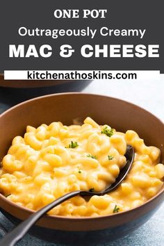 macaroni and cheese in a bowl with a spoon