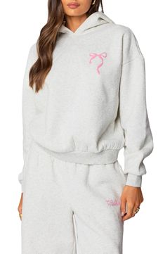 A bow-embellished logo graphic adds a sweet flourish to the back of this slouchy cotton-blend hoodie that's perfect for off-duty days. Fixed hood Ribbed cuffs and hem 50% cotton, 50% polyester Machine wash, dry flat Imported Trendy Heather Grey Sweatshirt For Loungewear, Nordstrom Store, Signature Design, Grey Hoodie, Bow Detail, Logo Graphic, Off Duty, Top Brands, Cotton Blend