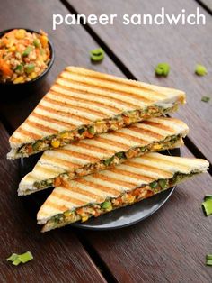 two sandwiches stacked on top of each other with the words paneer sandwich above them