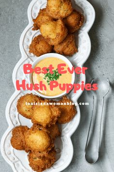 the best ever hush puppies are served on white plates with silverware and spoons