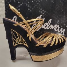 Stunning Sam Edelman Women's Tillie Wedge Pumps Patent Gold Leather Upper W/Black Suede Leather Synthetic Sole Heel Measures Approximately 5" Platform Measures Approximately 1.75" Adjustable Ankle Strap With Buckle Closure Lightly Padded Insole Only Tried On Indoors-Never Used Nib